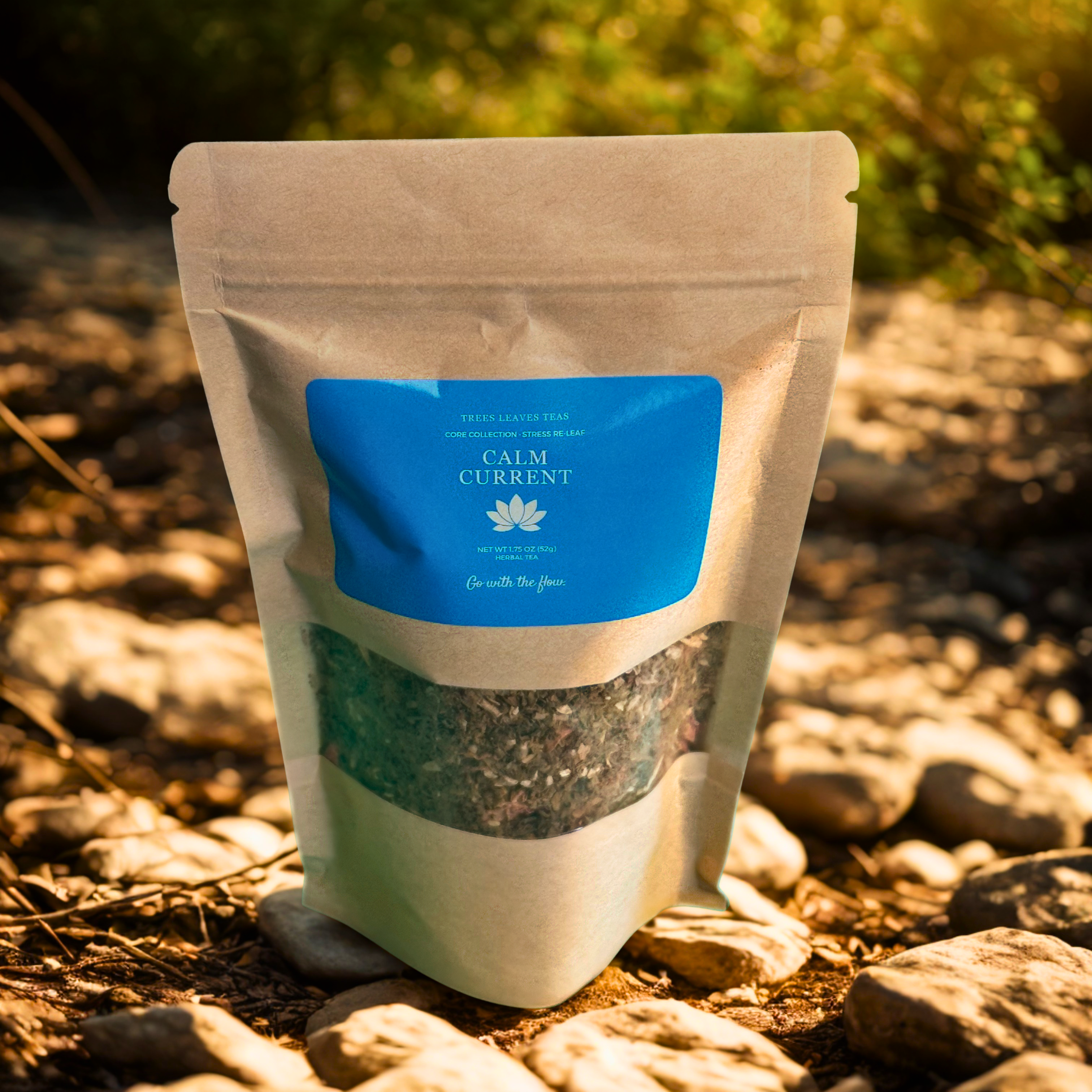 Bag of tea with a blue label by Trees Leaves Teas on a natural background